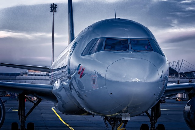 Passenger plane at an airport gate before departure